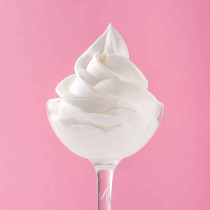 plain tart frozen yogurt on pink background